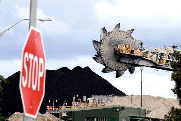 A bucket-wheel dumping soil and sand removed from another area of a Newcastle mine, the world's largest coal exporting port, in Australia on Nov. 5, 2021. (Saeed Khan/AFP via Getty Images)