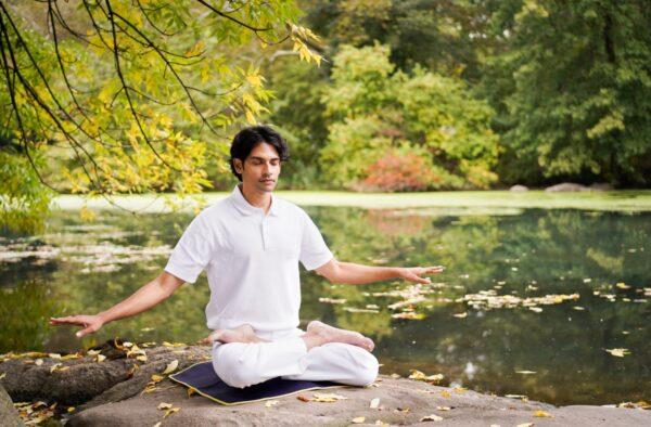 A Falun Gong practitioner sitting in meditation. The discipline's popularity was such that between 70 million and 100 million people took up the practice in China within a decade. (Samira Bouaou/The Epoch Times)