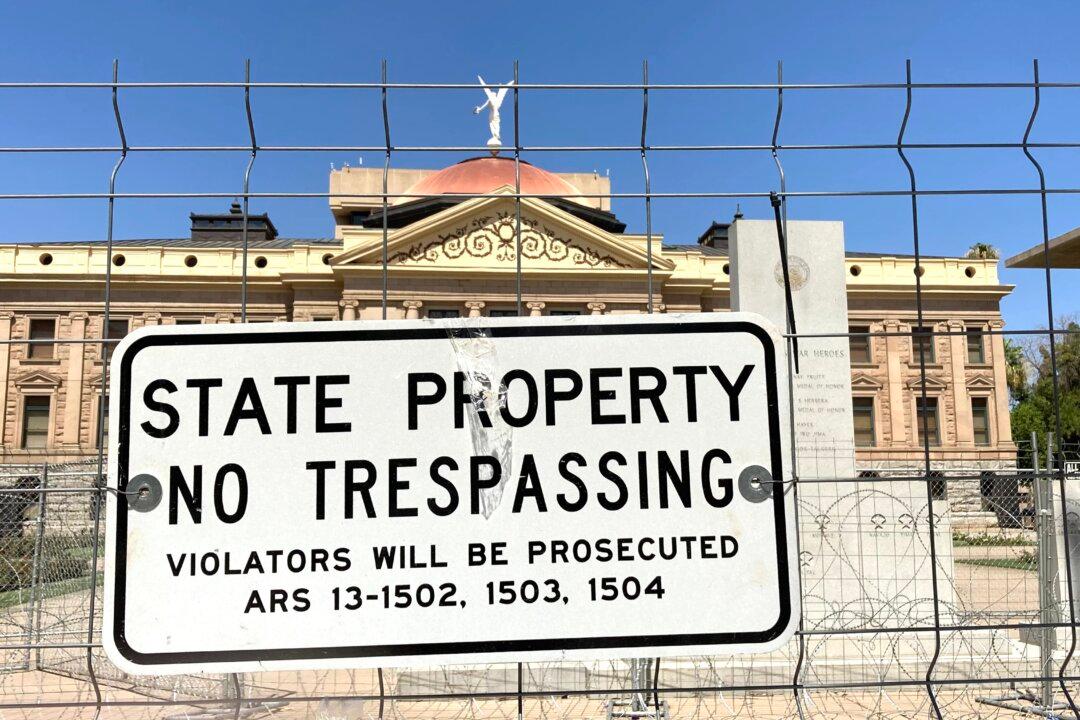 Fortress-Like Fence in Place Around Arizona’s Capitol Following Riot