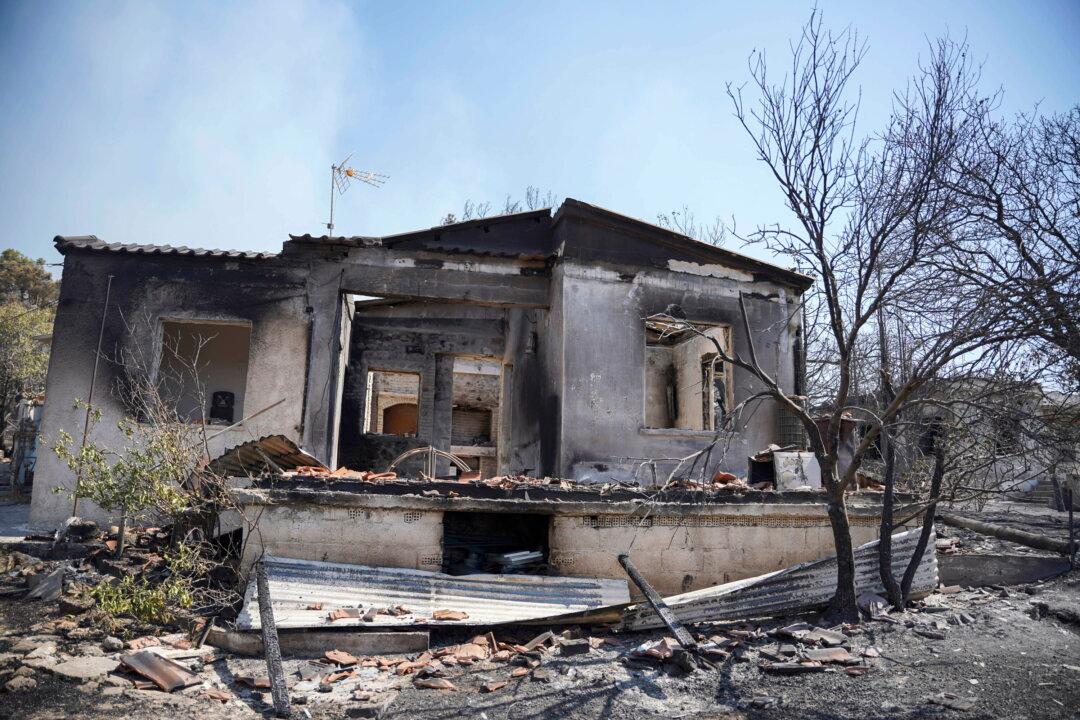 Firebreaks Halt Blaze on Greek Island, Homes Saved