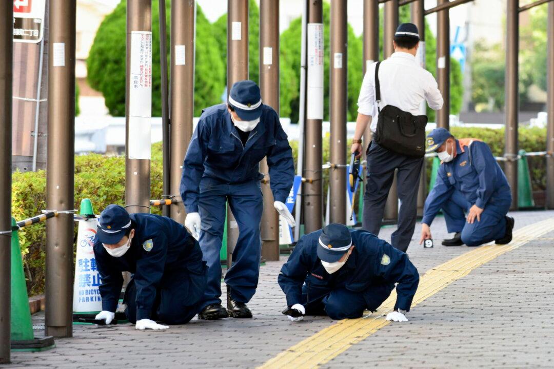 Japan Police Find Bullet Marks Near Abe Assassination Site