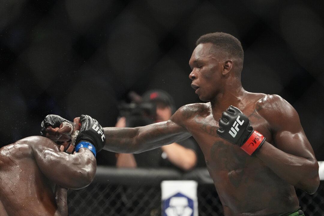 Adesanya, Volkanovski Retain Titles at UFC 276