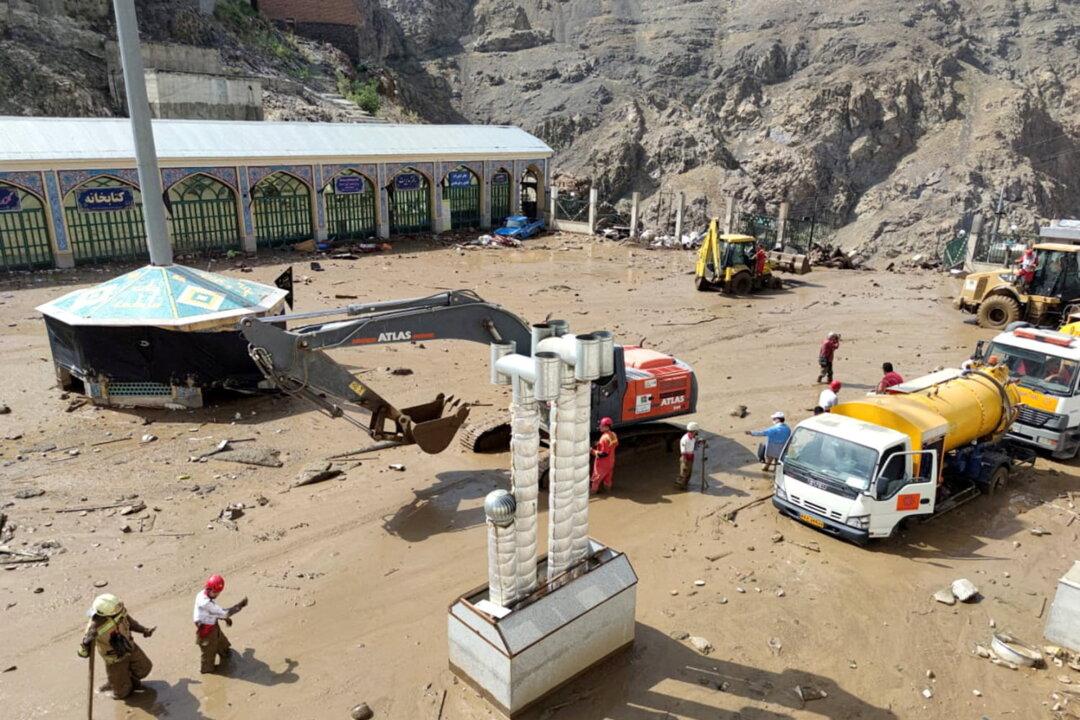 Rescuers Search for Landslide and Flood Victims After Heavy Rain in Iran