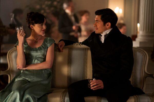 Dakota Johnson as Anne Elliot and Henry Golding as Mr. Elliot in "Persuasion." (Nick Wall/Netflix)
