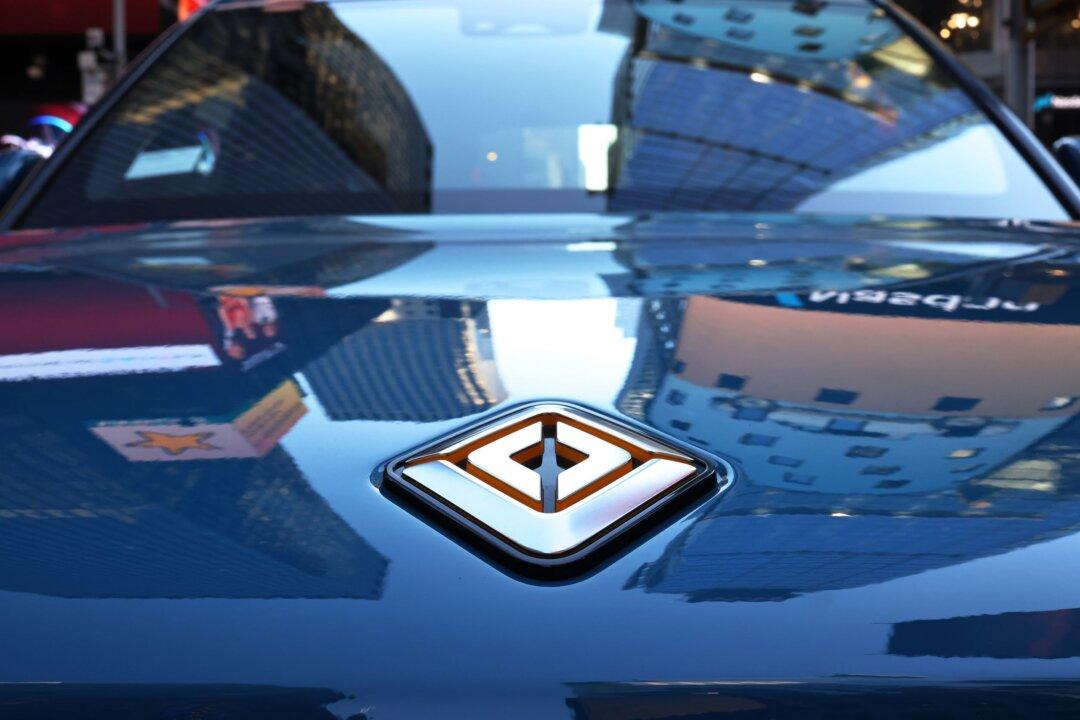 Rivian to Address Layoffs at Friday Meeting, Tesla to Cut 229 Jobs