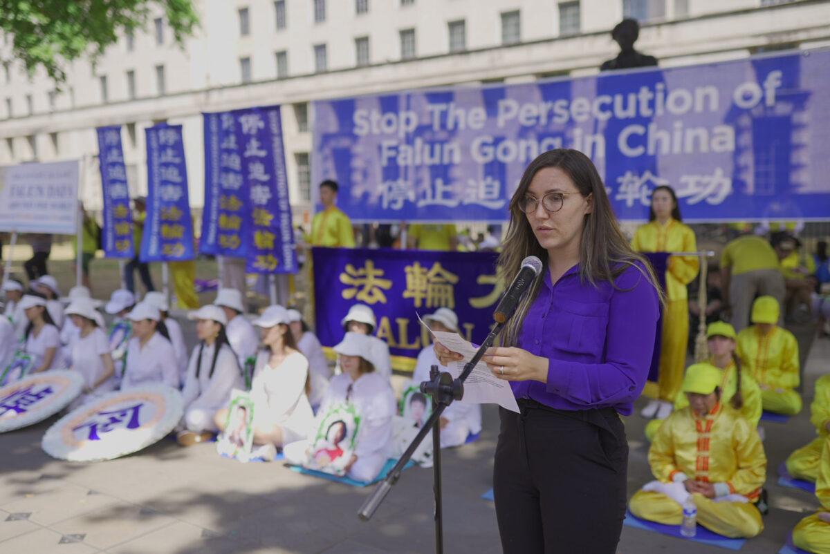 Victoria White, UK communications coordinator at The International Coalition to End Transplant Abuse in China, speaks at a rally highlighting the 23rd year of persecution in China against the spiritual discipline Falun Gong, in London on July 16, 2022. (Yanning Qi/The Epoch Times)