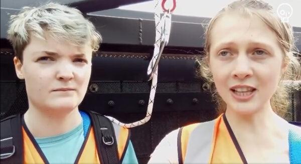 Handout screen grab taken from a video issued by Just Stop Oil of a group of their activists on July 20, 2022.