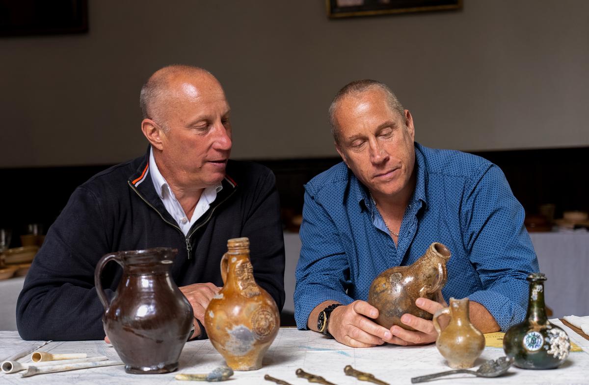 Julian and Lincoln Barnwell with some of their discoveries. (Courtesy of University of East Anglia)