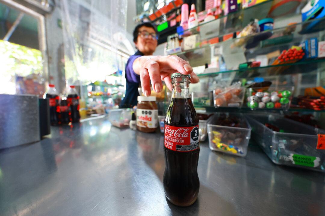 Coca-Cola Boosts Annual Revenue Forecast After Unexpected Surge in Demand