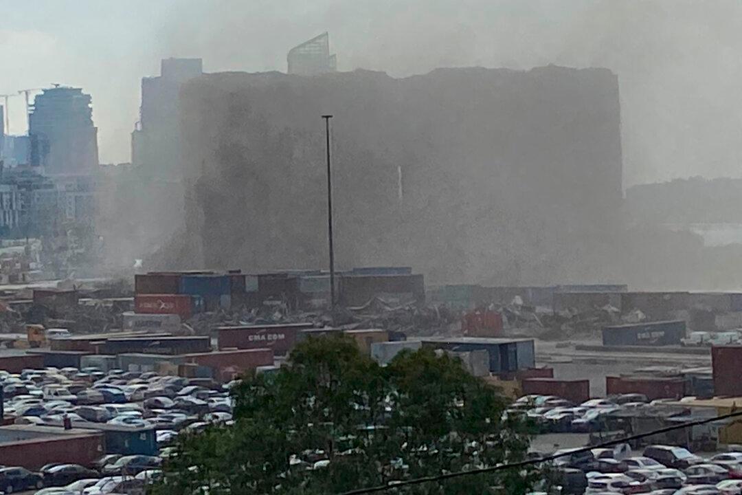 Part of Beirut Port Silos, Damaged in 2020 Blast, Collapses