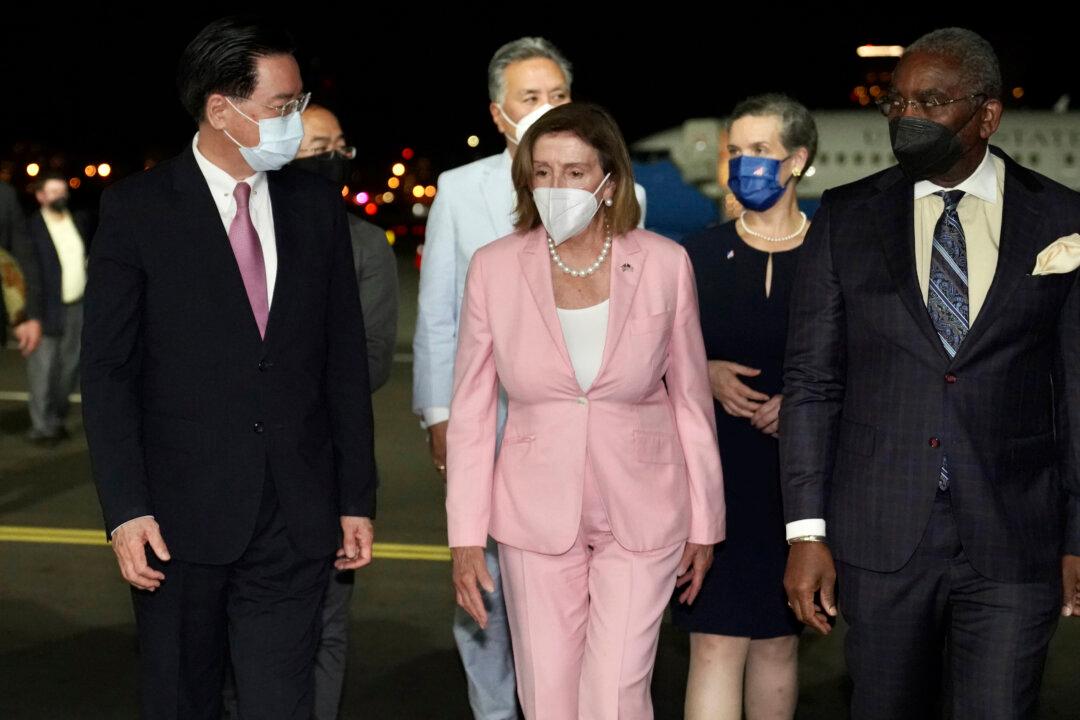 Pelosi Arrives in Taiwan Amid Beijing’s Threats of Military Violence