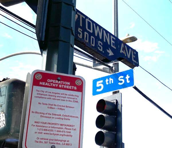 The corner of Town Avenue and Fifth Street in the section of downtown Los Angeles known as Skid Row has been expanding in recent months due to an increase in homelessness. (Allan Stein/The Epoch Times)