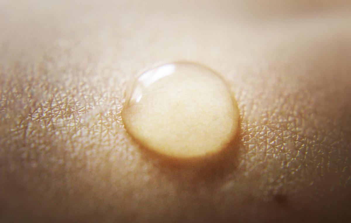 A drop of water on human skin. (i__am__am/Shutterstock)