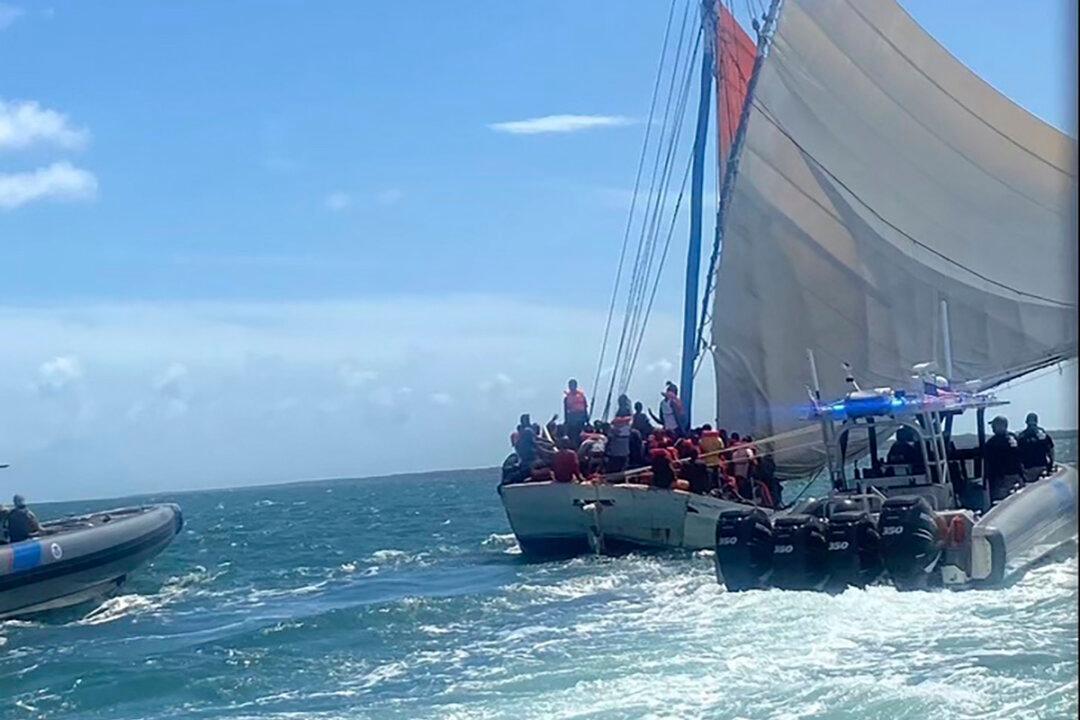 Coast Guard: 2 Dead, 5 Missing After Migrant Boat Capsizes