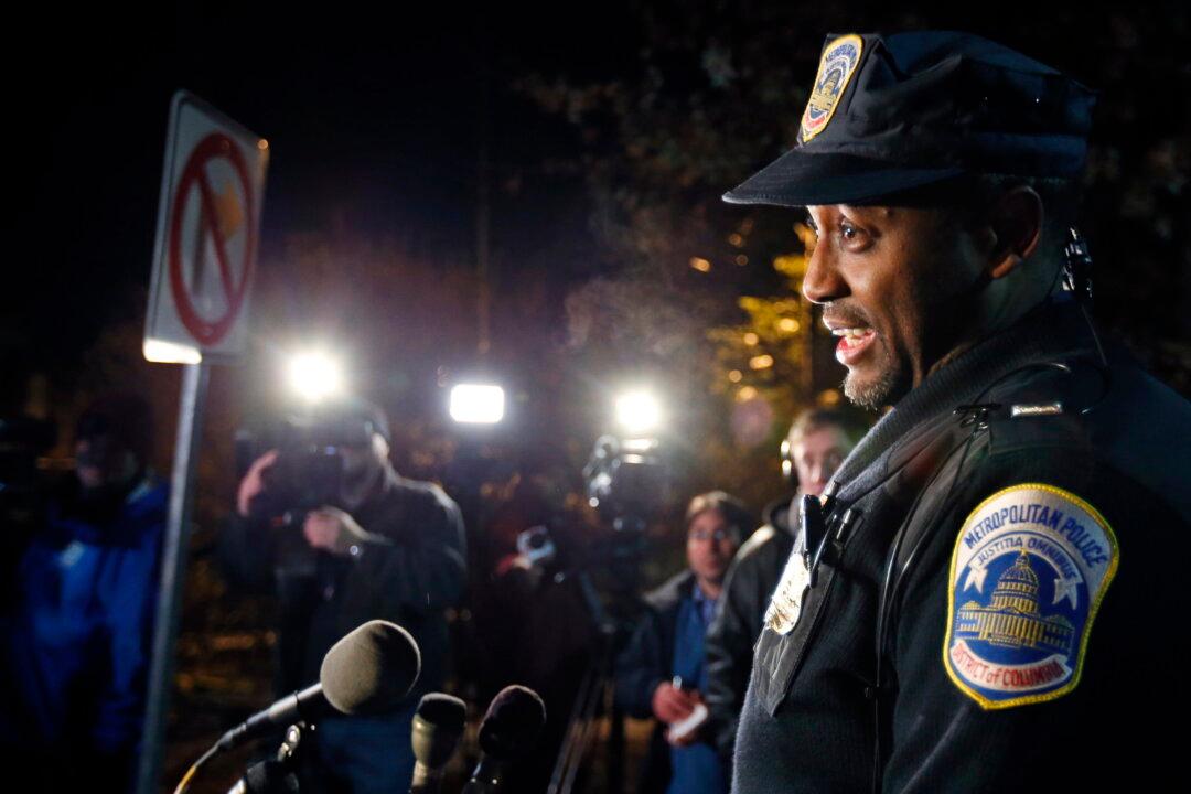 Ex-Lieutenant Arrested in Library Officer’s Shooting Death