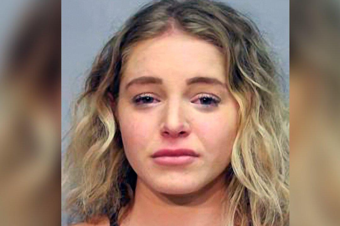 Woman Charged With Murdering Boyfriend Caught on Camera Beating Him