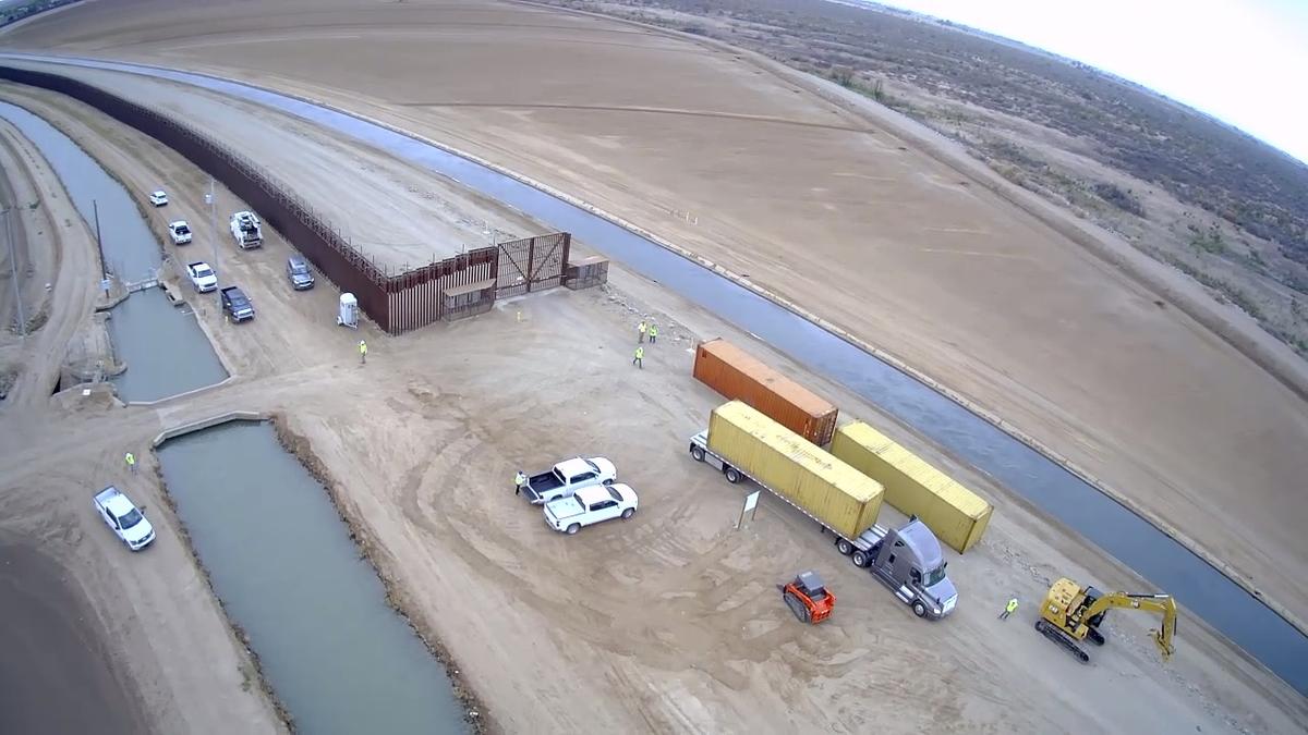 Biden Administration Tells Arizona Using Shipping Containers to Plug Gaps in Border Wall Is Illegal