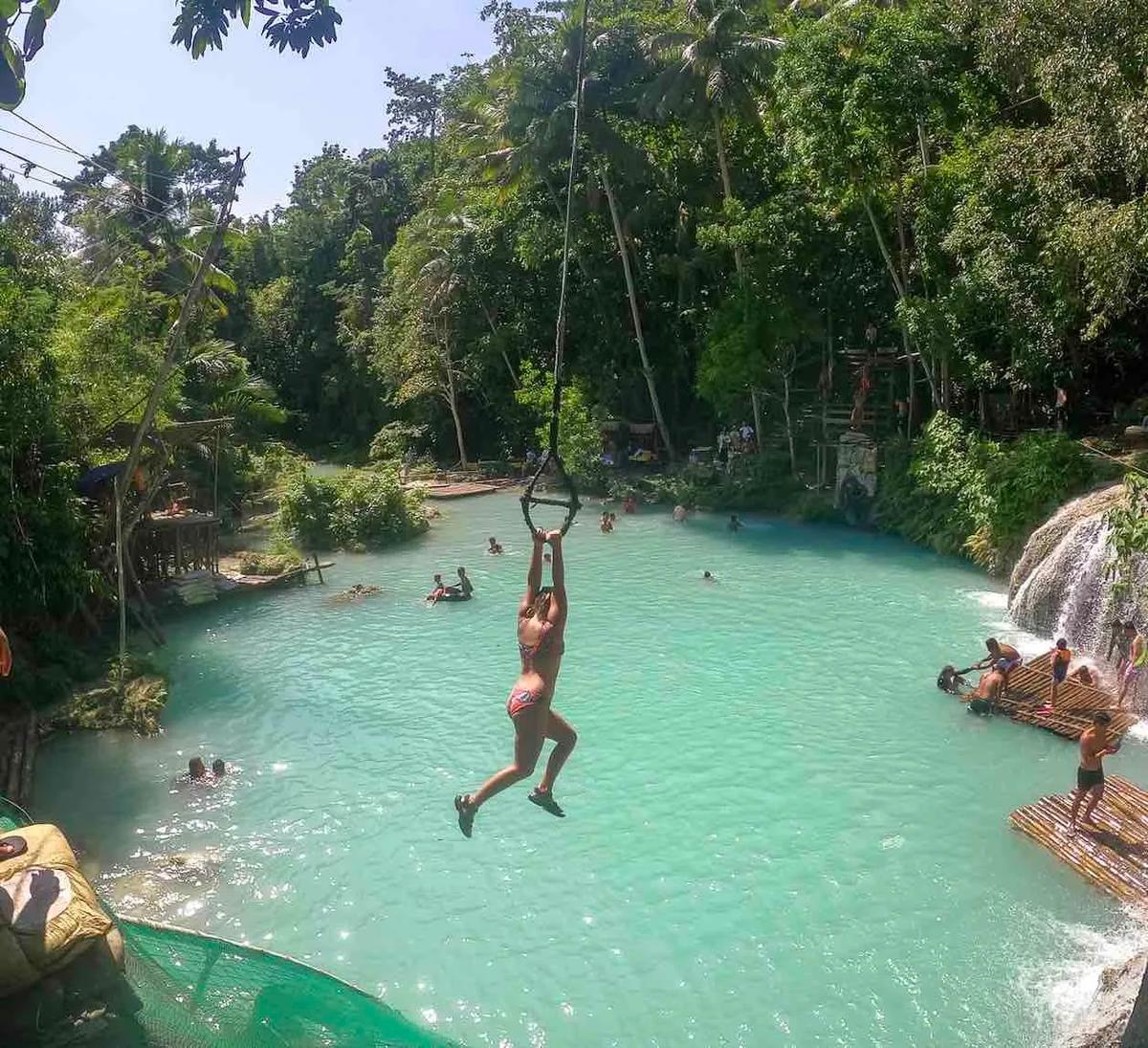 Rope swings at Cambugahay Falls. (Courtesy of Evie Farrell)