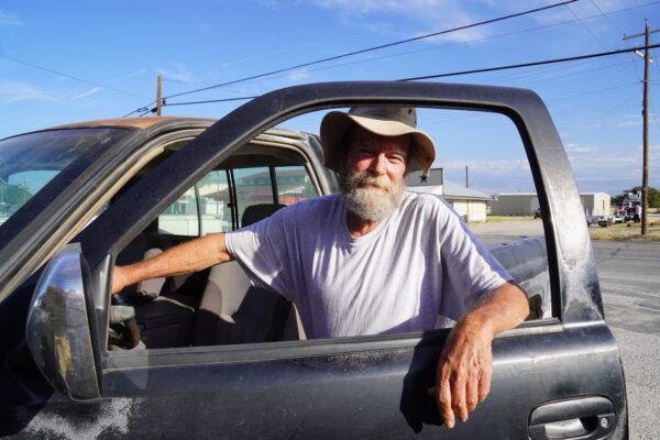 Cattle rancher George Taff prepares to leave a coffee shop in Cross Plains, Texas, on Aug. 9, 2022. Taff said he may have to sell all of his 95 head of cattle because of drought. (Allan Stein/The Epoch Times)