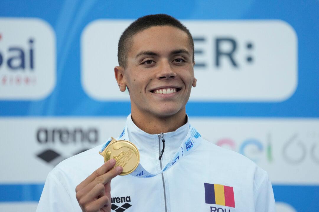 Romanian Teen Swimmer Popovici Breaks 100-Meter Freestyle World Record