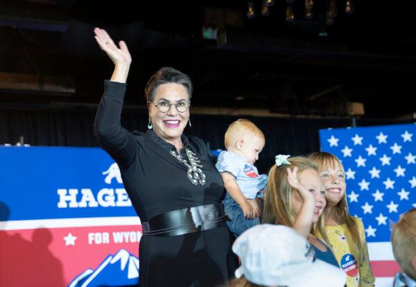 Wyoming Republican congressional candidate Harriet Hageman waves as she takes a picture with children during a primary election night party in Cheyenne, Wyoming, on Aug. 16, 2022. (Michael Smith/Getty Images)