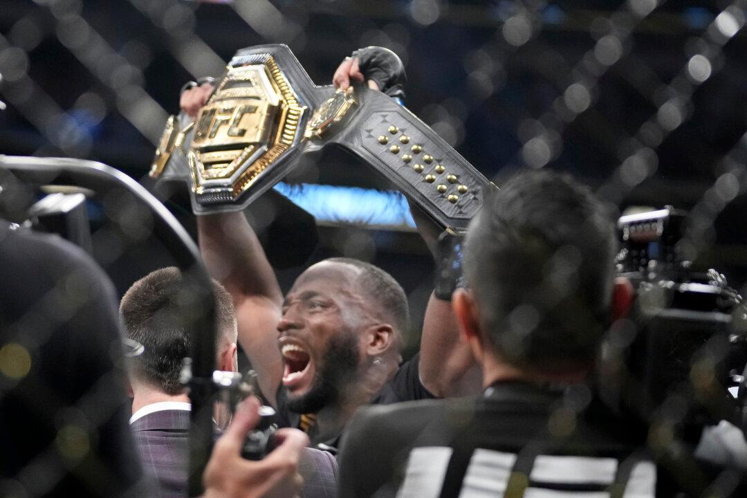 Edwards Stops Usman Late in 5th, Wins UFC Welterweight Title