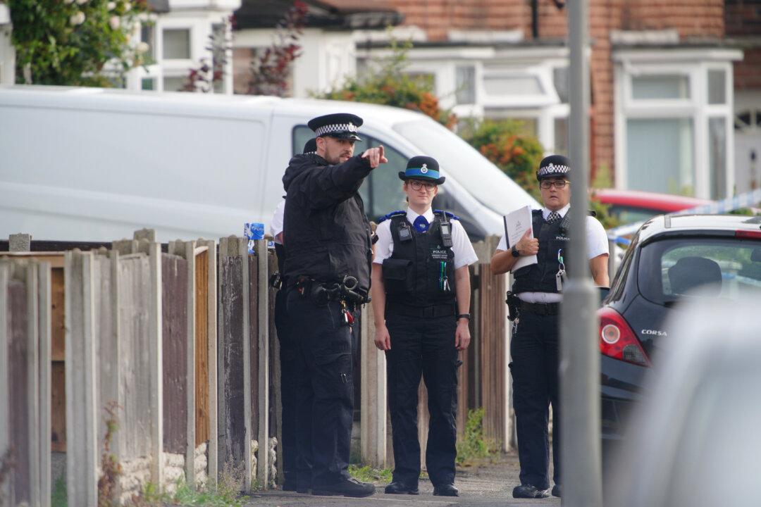 Girl, 9, Shot Dead in Liverpool by Gunman Who Chased Stranger Into Her Home