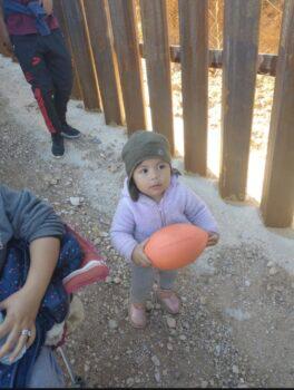 A child left alone at the border fence in Arizona in March 2022. (Courtesy photo)
