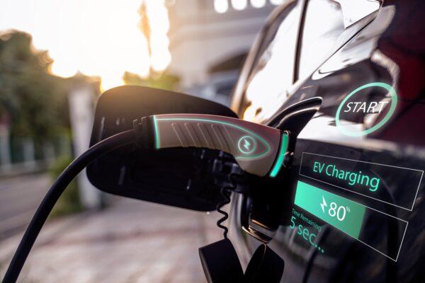 An electric car charging at a station. (Photo/Shutterstock)