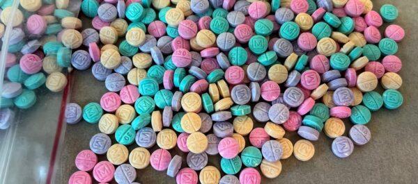 Brightly colored counterfeit M30 oxycodone pills. (Courtesy of the U.S. Drug Enforcement Administration)