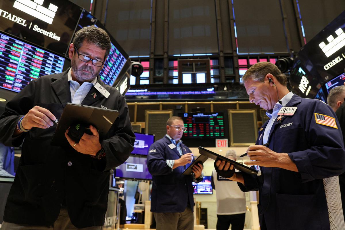 Wall Street Opens Higher on Tech Boost