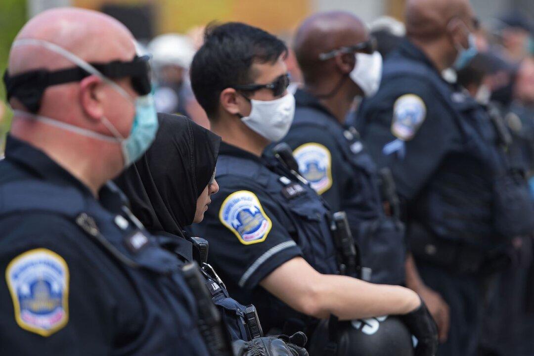 Federal Judge Blocks Arizona Law That Restricts Filming of Police