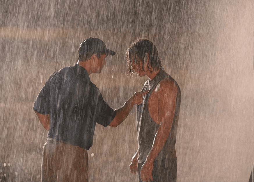 Coach Eric Taylor (Kyle Chandler, L) throws ne'er-do-well fullback Tim Riggins (Taylor Kitsch) off the team, in "Friday Night Lights." (Universal Television)