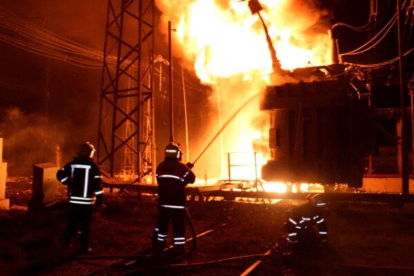 Firefighters work to extinguish a blaze at a site of a thermal power plant damaged by a missile strike in Kharkiv, Ukraine, on Sept. 11, 2022. (Press service of the State Emergency Service of Ukraine/Handout via Reuters)