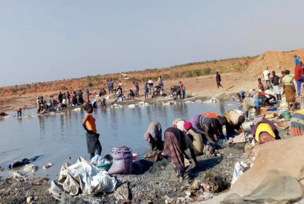 Miners at a cobalt cleaning site in Lualaba Province, the Democratic Republic of the Congo. (Northwestern Now)