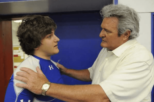 Little Buddy Garrity (Joey Truty) and Big Buddy Garrity (Brad Leland), in "Friday Night Lights." (Universal Television)