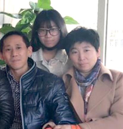Undated photo of Feng's family. From left to right: Feng Zhenguo, a daughter, and Feng's wife Han Yanjing (Courtesy of Feng Zhenguo)