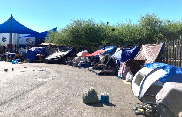 A row of tents on 12th Street in Phoenix in an area known as "The Zone" on Sept. 18. (Allan Stein/The Epoch Times)