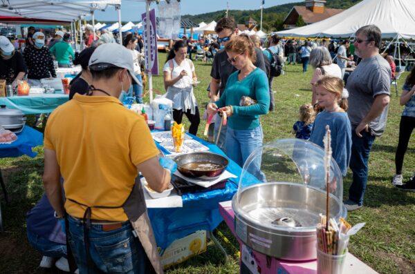 A view of the food court at the Moon Festival in Deerpark, New York, on Sept. 17, 2022. (Courtesy of New Century Film)