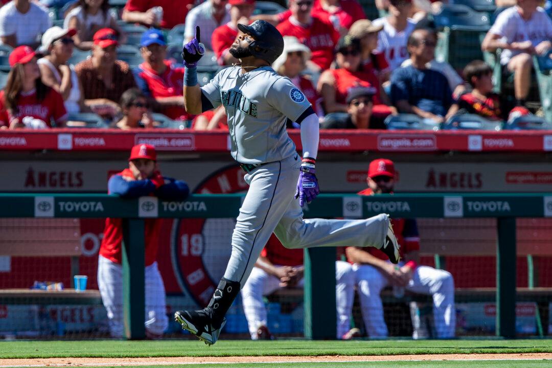 Santana Homers Twice, Drives in 5—Mariners Slam Angels 9–1