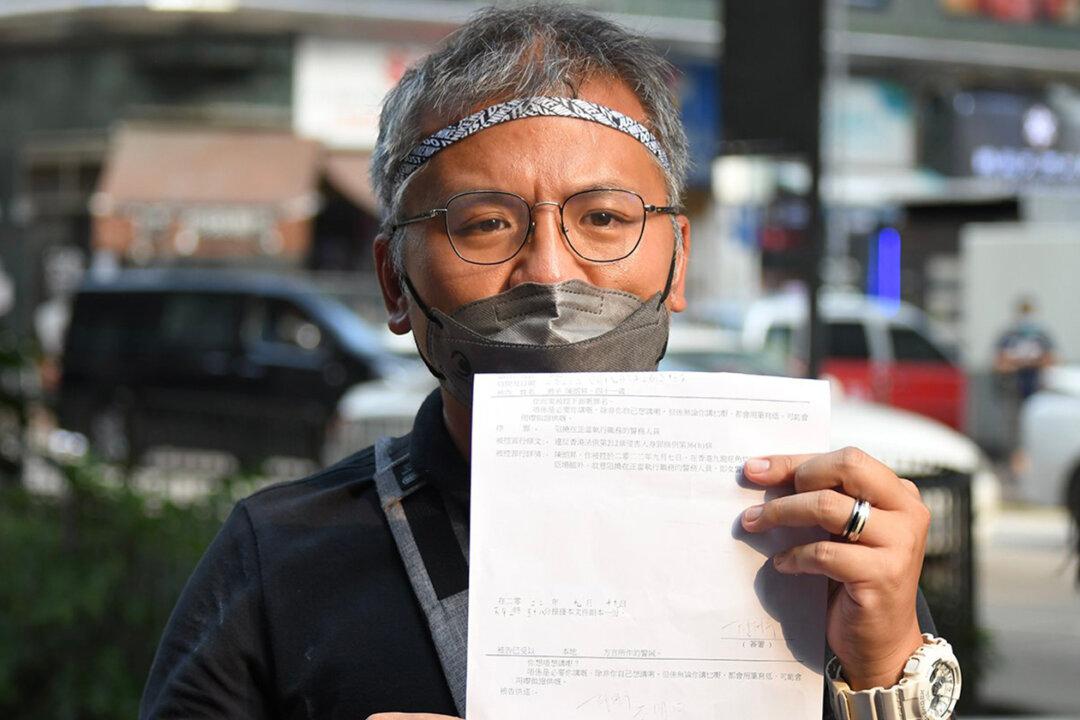 Chairman of Hong Kong Journalists Association Accused of ‘Obstructing Police Work,’ Due to Appear in Court
