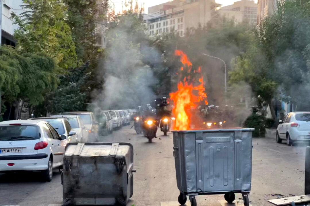 Iranians Continue Protests Over Woman’s Death in Custody; Death Toll Rises and Internet Curbed