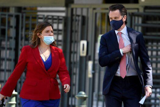 Member for Bankstown Tania Mihailuk (left) and NSW Labor Leader Chris Minns arrives to address media during a press conference in Sydney, Tuesday, October 5, 2021. (AAP Image/Dan Himbrechts)