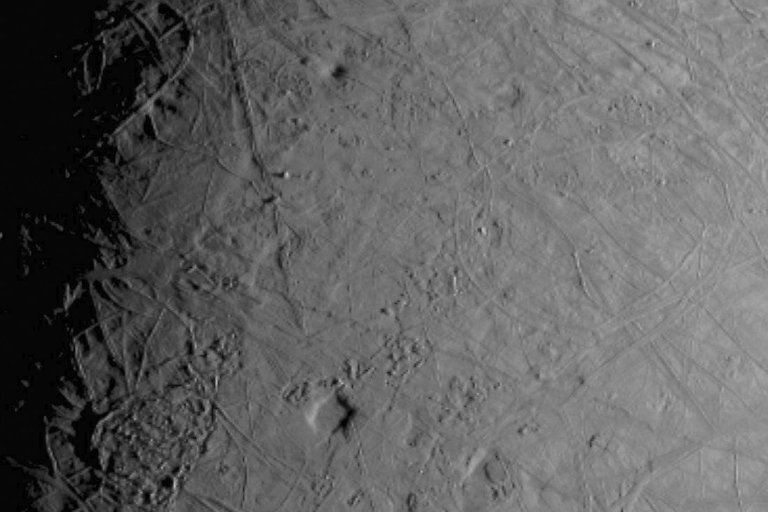 The complex, ice-covered surface of Jupiter's moon Europa, captured by NASA's Juno spacecraft during a flyby on Sept. 29, 2022. (NASA/JPL-Caltech/SWRI/MSSS via AP)