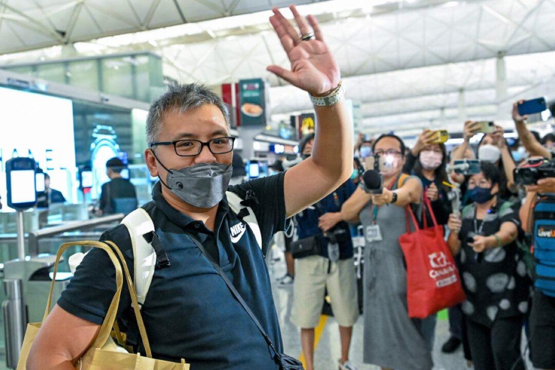 Chairman of Hong Kong Journalists Association Travels to UK While on Bail