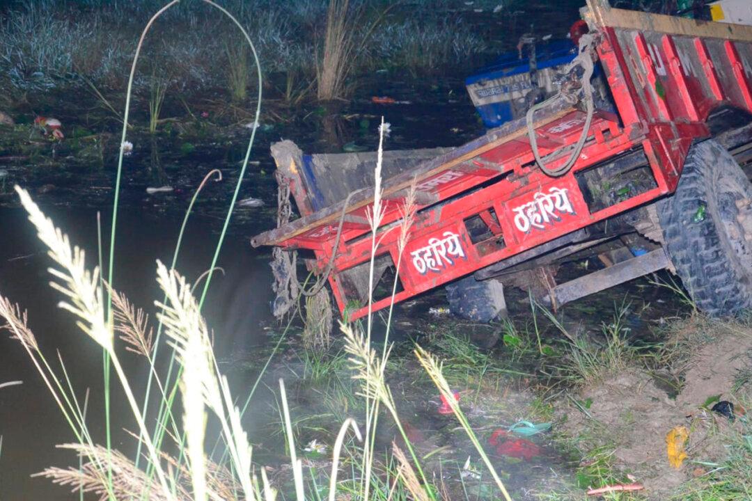 Farm Vehicle Packed With People Overturns in India; 26 Dead
