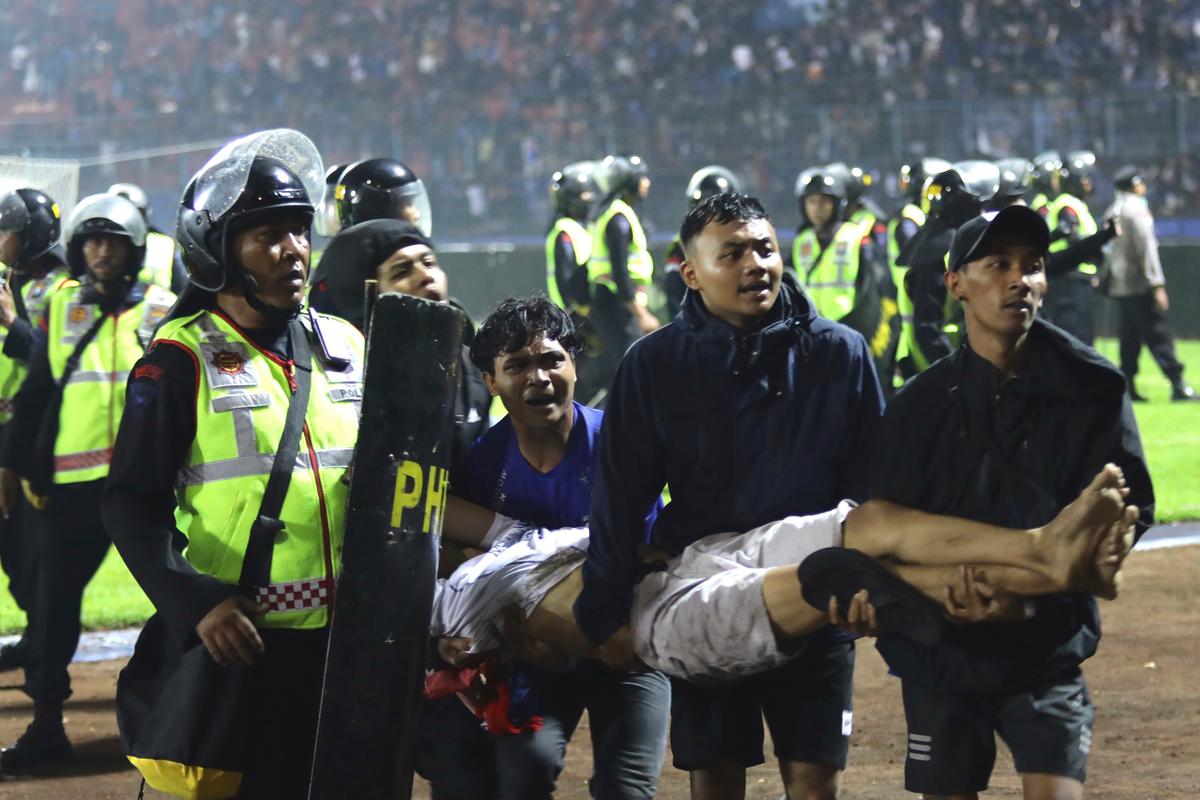 125 Die as Tear Gas Triggers Crush at Indonesia Soccer Match