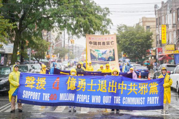 Falun Gong practitioners attend a parade in Brooklyn, New York City, on Oct. 2, 2022, to call for an end to the Chinese regime's persecution. (Zhang Jingchu/The Epoch Times)