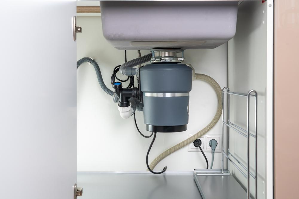 Be sure to unplug the garbage disposal and turn it off at the electrical panel before starting repairs.(mariakray/Shutterstock)