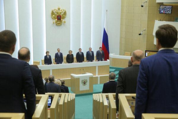 Members of Russia's Federation Council, the upper house of parliament, attend a session to ratify legislation on annexing Ukraine's Donetsk, Kherson, Luhansk, and Zaporizhzhia regions into Russia, in Moscow on Oct. 4, 2022. (Russian Federation Council/Handout via Reuters)